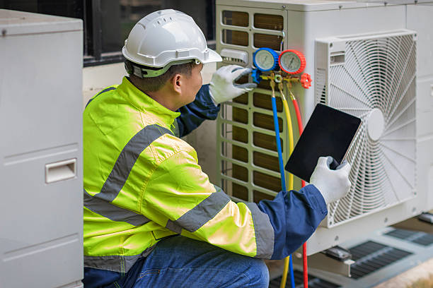 Professional Air Conditioning Repair technician working in Fairhaven, MA